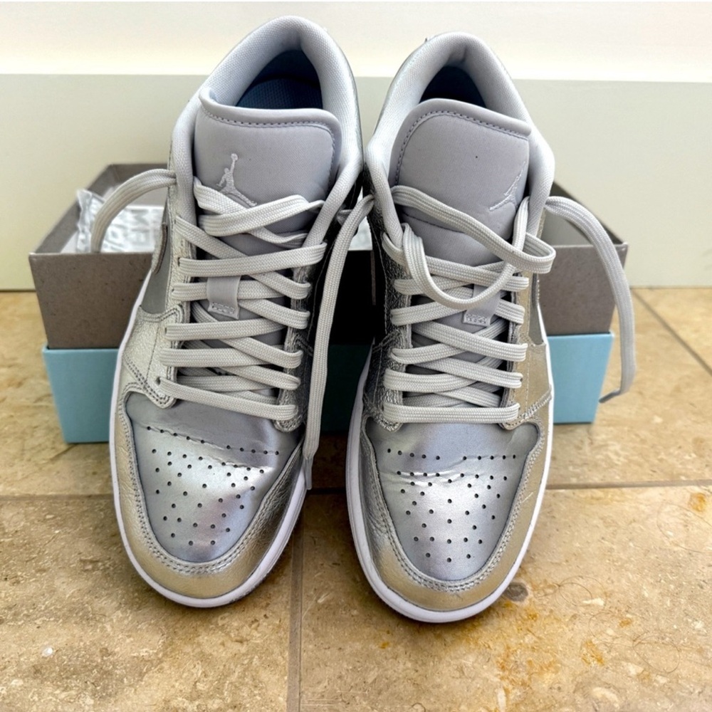 Nike Women's Air Jordan 1 Sneakers in Silver and Gray